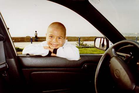 Diego looking into car